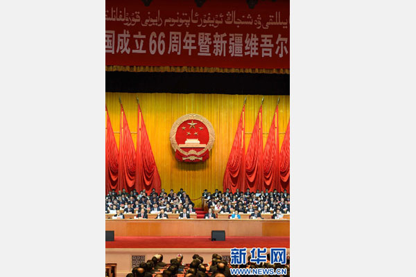 10月1日，慶祝中華人民共和國(guó)成立66周年暨新疆維吾爾自治區(qū)成立60周年大會(huì)在新疆人民會(huì)堂隆重舉行。 新華社記者 高潔 攝 