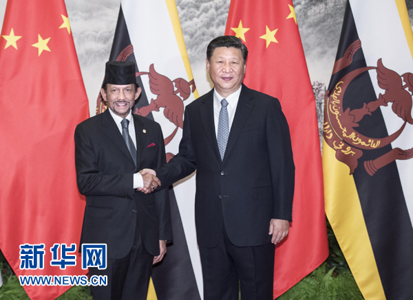 9月13日，國(guó)家主席習(xí)近平在北京人民大會(huì)堂同文萊蘇丹哈桑納爾舉行會(huì)談。 新華社記者 李濤 攝
