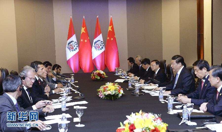7月16日，國家主席習(xí)近平在巴西首都巴西利亞會見秘魯總統(tǒng)烏馬拉。新華社記者 劉建生 攝  