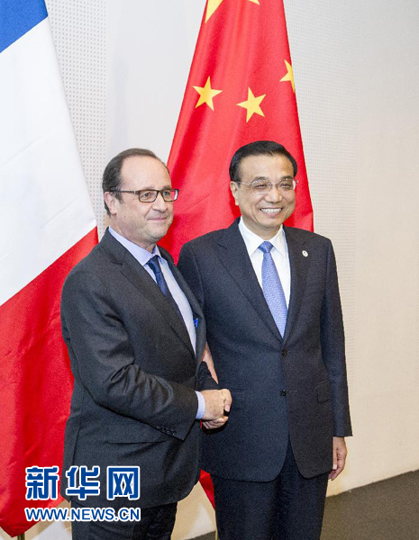 10月16日，中國國務(wù)院總理李克強在米蘭會見法國總統(tǒng)奧朗德。新華社記者 王曄 攝
