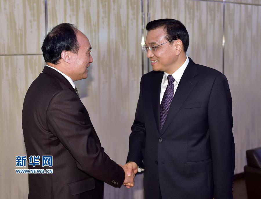 1月22日，中國國務(wù)院總理李克強在瑞士蘇黎世會見國際電信聯(lián)盟秘書長趙厚麟。 新華社記者 李濤 攝 

