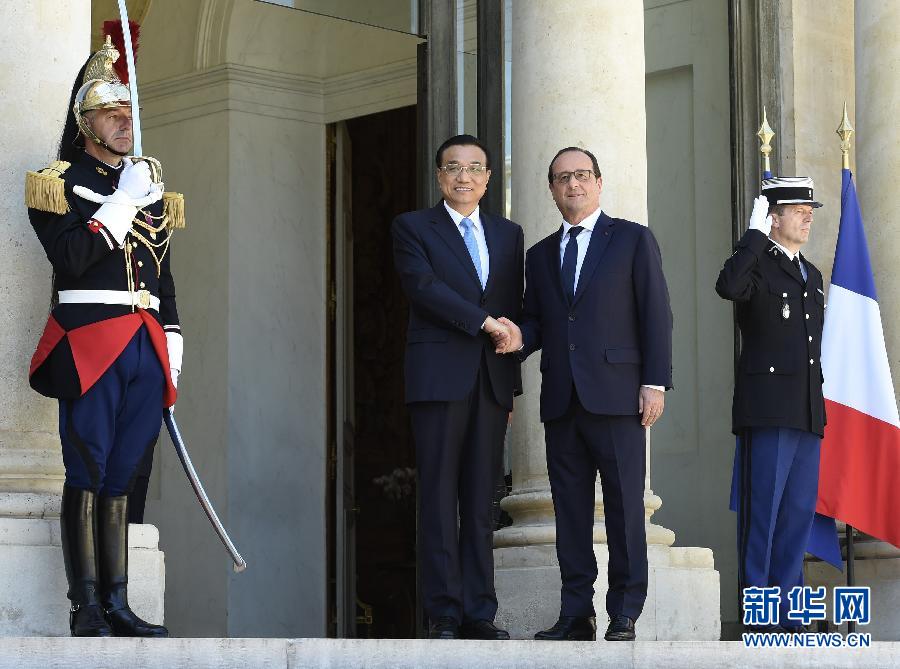 當?shù)貢r間6月30日下午，國務(wù)院總理李克強在巴黎愛麗舍宮會見法國總統(tǒng)奧朗德。 新華社記者李學仁攝