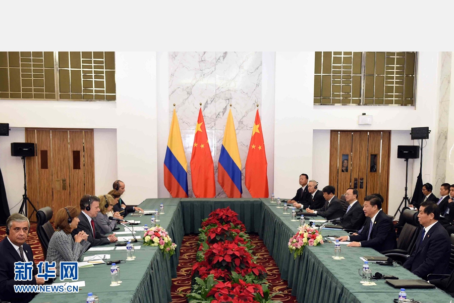 11月18日，國(guó)家主席習(xí)近平在菲律賓馬尼拉會(huì)見哥倫比亞總統(tǒng)桑托斯。 新華社記者 饒愛民 攝